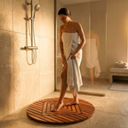 Woman standing on a teak shower mat in a bathroom