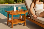 Teak Culture shower bench next to woman's arm